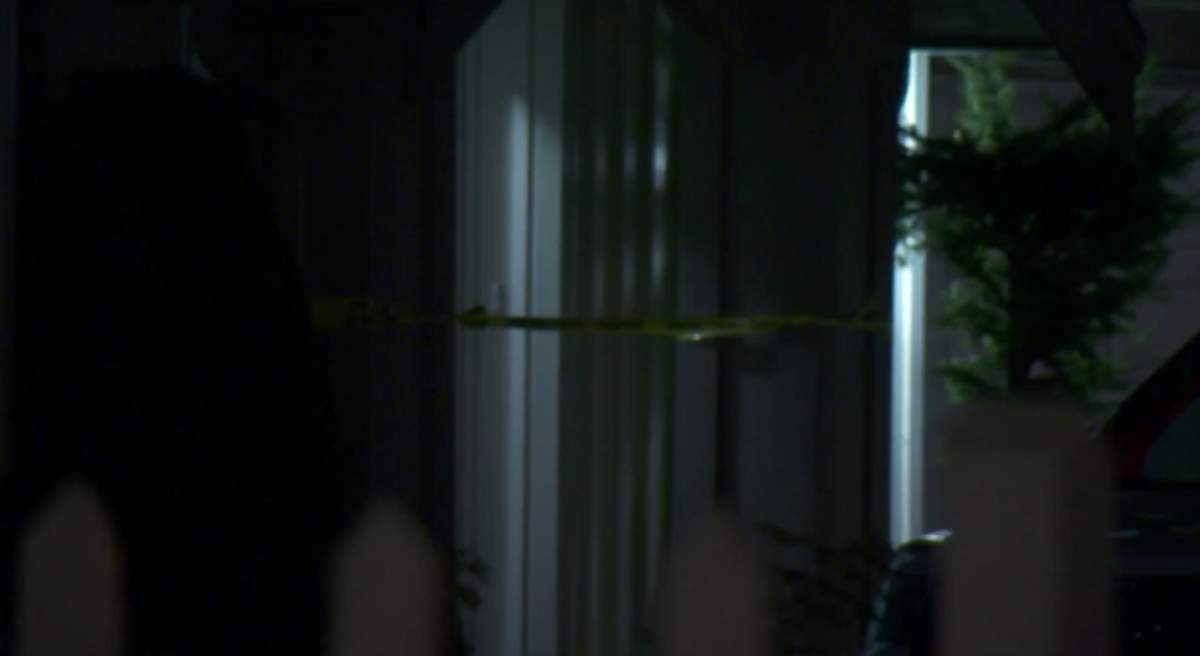 Yellow tape can be seen marking off the crime scene areas.