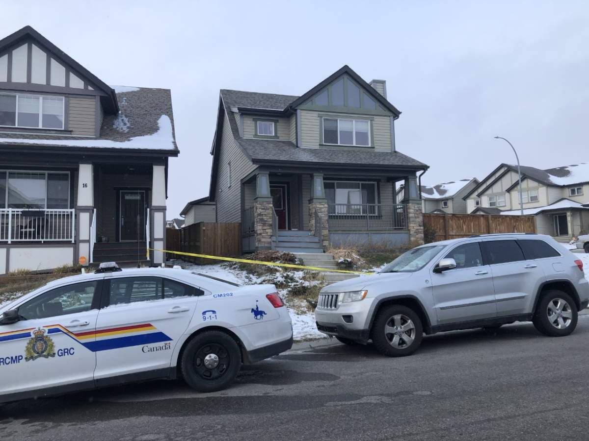 RCMP officers responded to a fatal stabbing in a Cochrane house in the Sunset Common area on Sunday, Oct. 18, 2020.