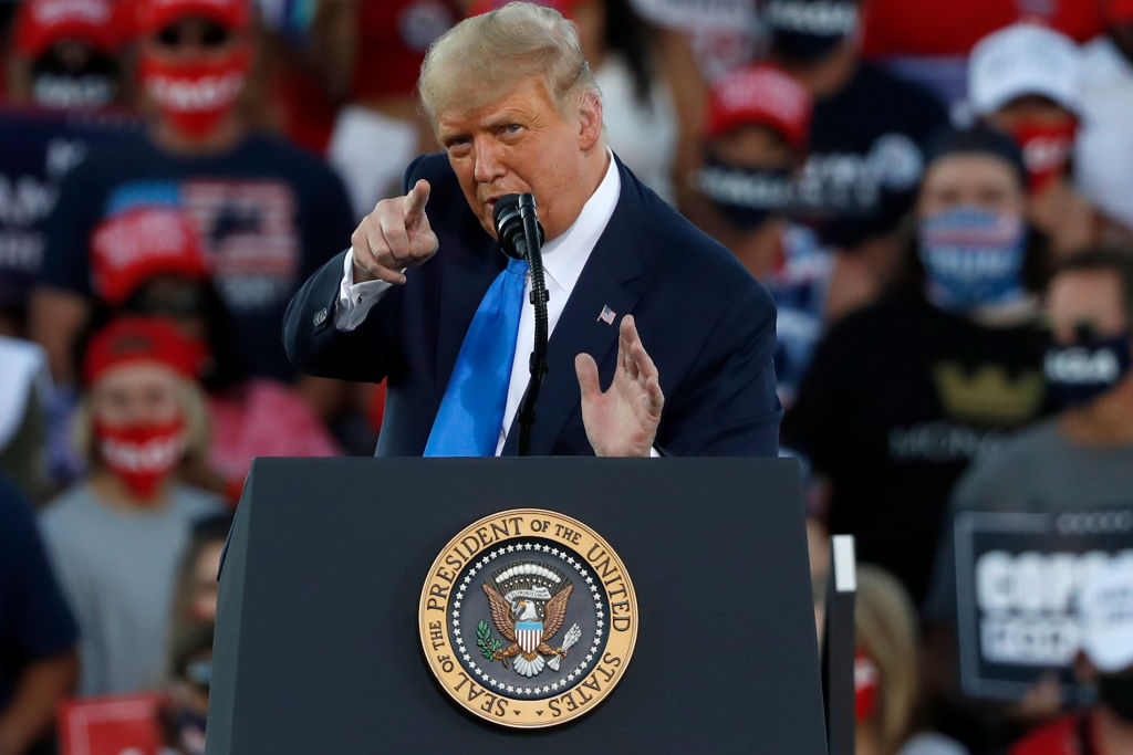 U.S. President Donald Trump gestures during a campaign rally on October 18, 2020 in Carson City, Nevada.