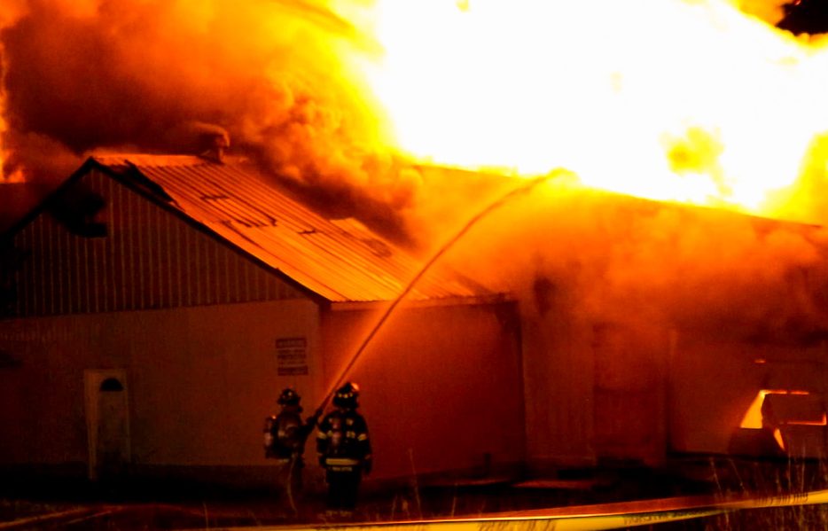 Moncton firefighters work to control a warehouse fire on Oct. 22, 2020. 