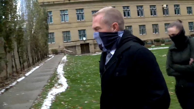 Const. Alex Dunn enters the Calgary Courts Centre on Oct. 28, 2020. 