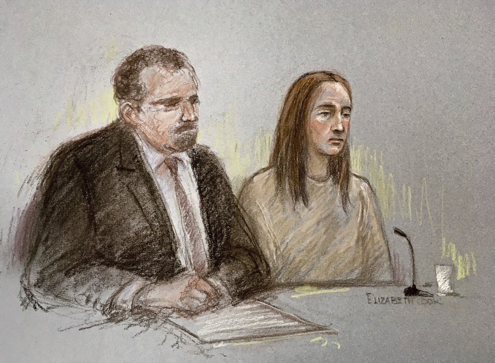 Court artist sketch by Elizabeth Cook, depicting Lucy Letby, next to her solicitor Richard Thomas, appearing via video link at court in Warrington, England, Thursday Nov. 12, 2020, charged with the murder of eight babies and the attempted murder of 10 others. Letby was arrested on Tuesday following an investigation into deaths at the neonatal unit of the Countess of Chester Hospital, south of Liverpool, and was remanded in custody after appearing via videolink during a brief 10-minute court hearing. 
