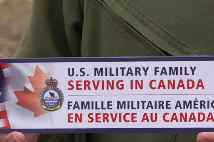 Members of 17 Wing Winnipeg create bumper stickers to help fellow U.S. air force members