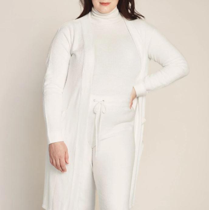 Cozzzy Lounge Cardigan, $80, available at Knix Forest Hill Candle, $30, available at Judes & Co.