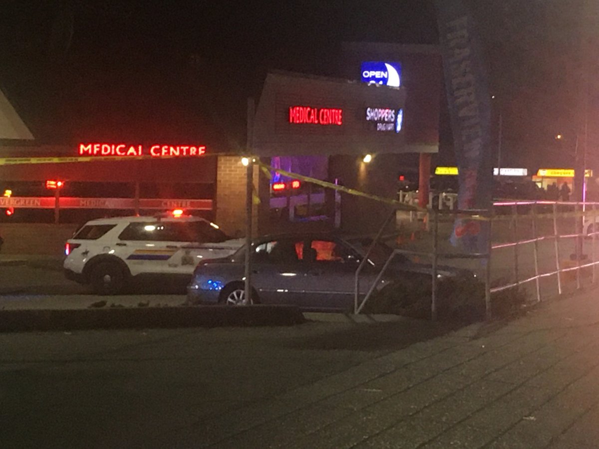 Surrey RCMP on the scene of a fatal targeted shooting outside Evergreen Mall on 152nd Street.