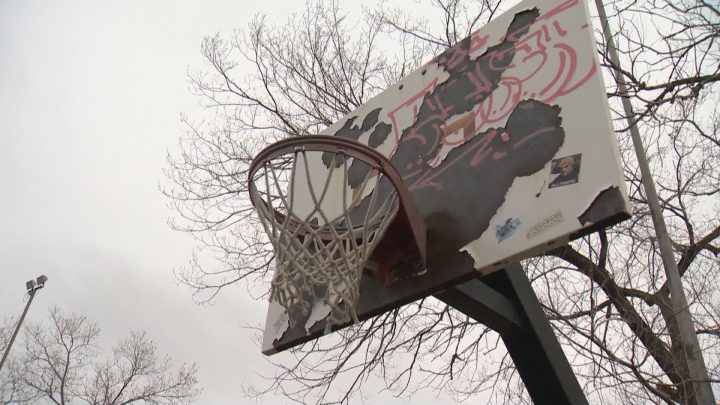 Peeling paint, torn mesh and graffiti show that his basketball court has seen better days. 