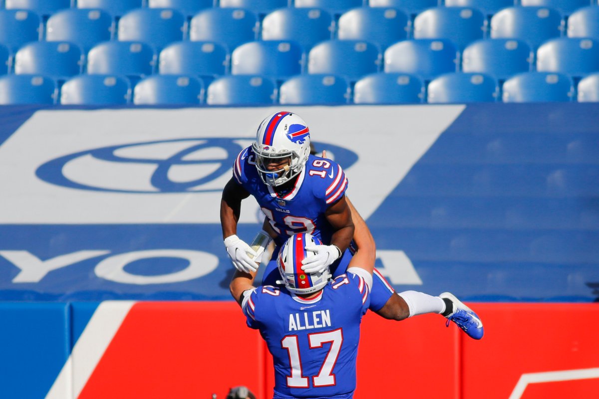 Buffalo Bills quarterback Josh Allen (17) celebrates with teammate Isaiah McKenzie after they connected for a touchdown during the first half of an NFL football game against the Seattle Seahawks Sunday, Nov. 8, 2020, in Orchard Park, N.Y.