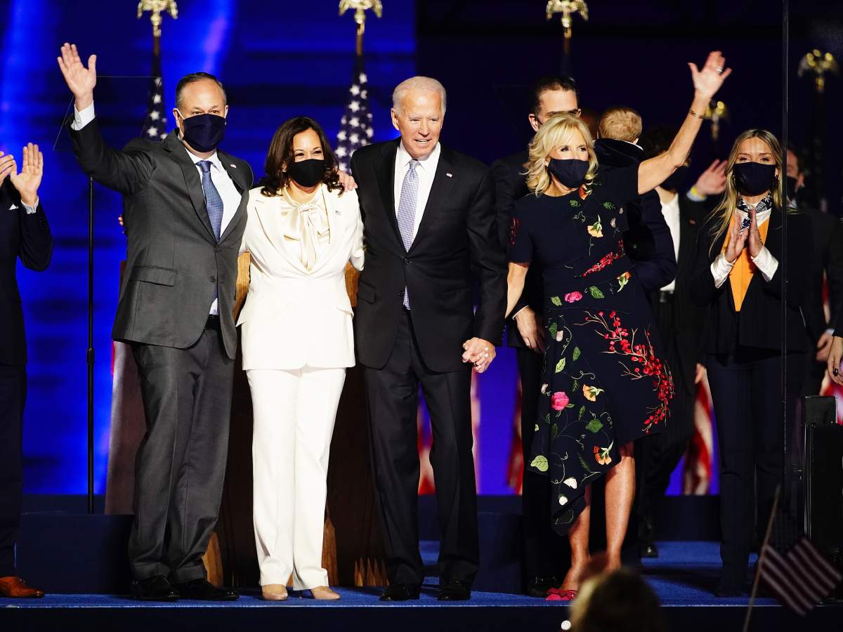 President-elect Joe Biden (2R) and Dr. Jill Biden (R) with Vice President Elect Kamala Harris (2L) and Doug Emhoff (L) are joined by family members wave after Biden delivered his victory address after being declared the winner in the 2020 presidential election in Wilmington, Delaware, USA, 07 November 2020. Biden defeated incumbent US President Donald J. Trump. EPA/JIM LO SCALZO.
