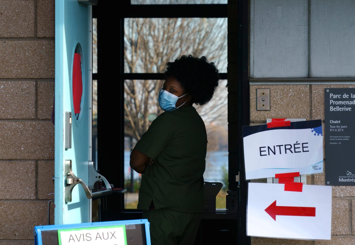 A nurse waits for patients at a COVID-19 testing clinic in Montreal, on Monday, November 9, 2020. 