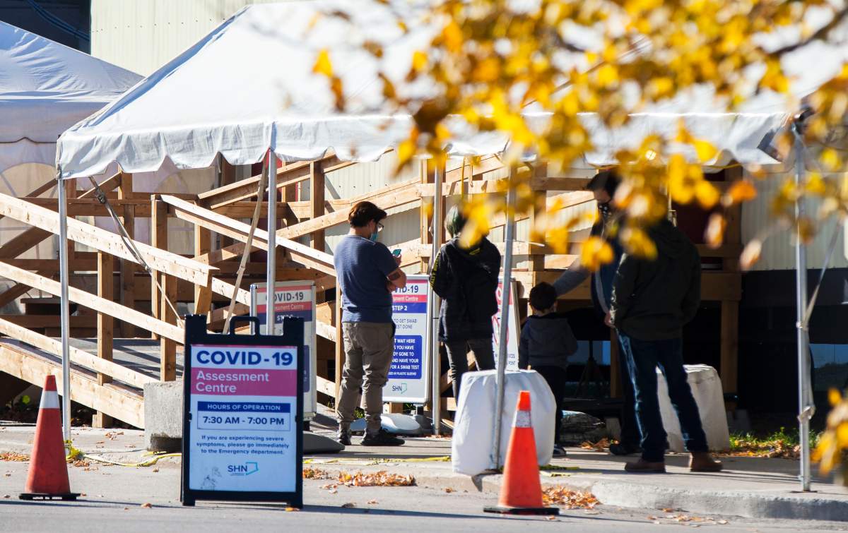 TORONTO, Nov. 8, 2020  People wearing face masks line up for COVID-19 test outside a COVID-19 assessment center in Toronto, Canada, on Nov. 8, 2020. Canada reported a total of 264,045 cases of COVID-19 and 10,522 deaths as of Sunday afternoon, according to CTV. (Photo by Zou Zheng/Xinhua) (Credit Image: © Zou Zheng/Xinhua via ZUMA Press).