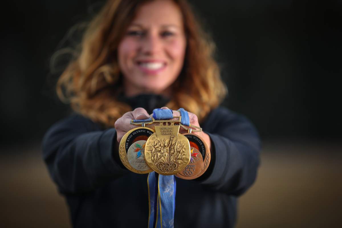 Team Canada’s Beijing 2022 Chef de Mission, Catriona Le May Doan, holds Olympic medals as she poses in Canmore, Alberta on Sunday, November 1, 2020. The two-time Olympic gold medallist in speedskating was named Canada’s 2022 chef de mission Tuesday by the Canadian Olympic Committee.