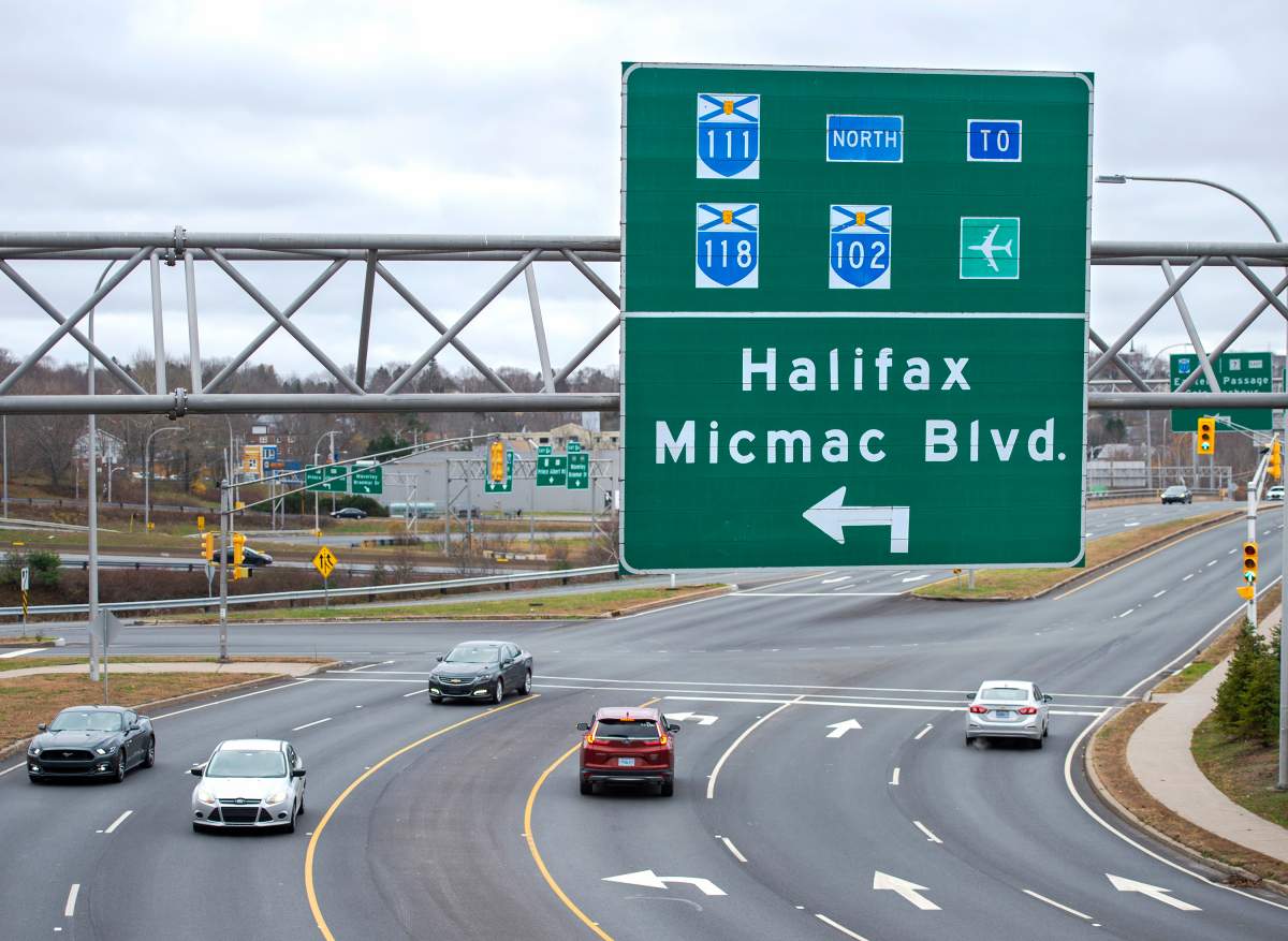 A road sign directs traffic heading to Micmac Blvd. in Dartmouth, N.S. on Wednesday, Nov. 18, 2020.