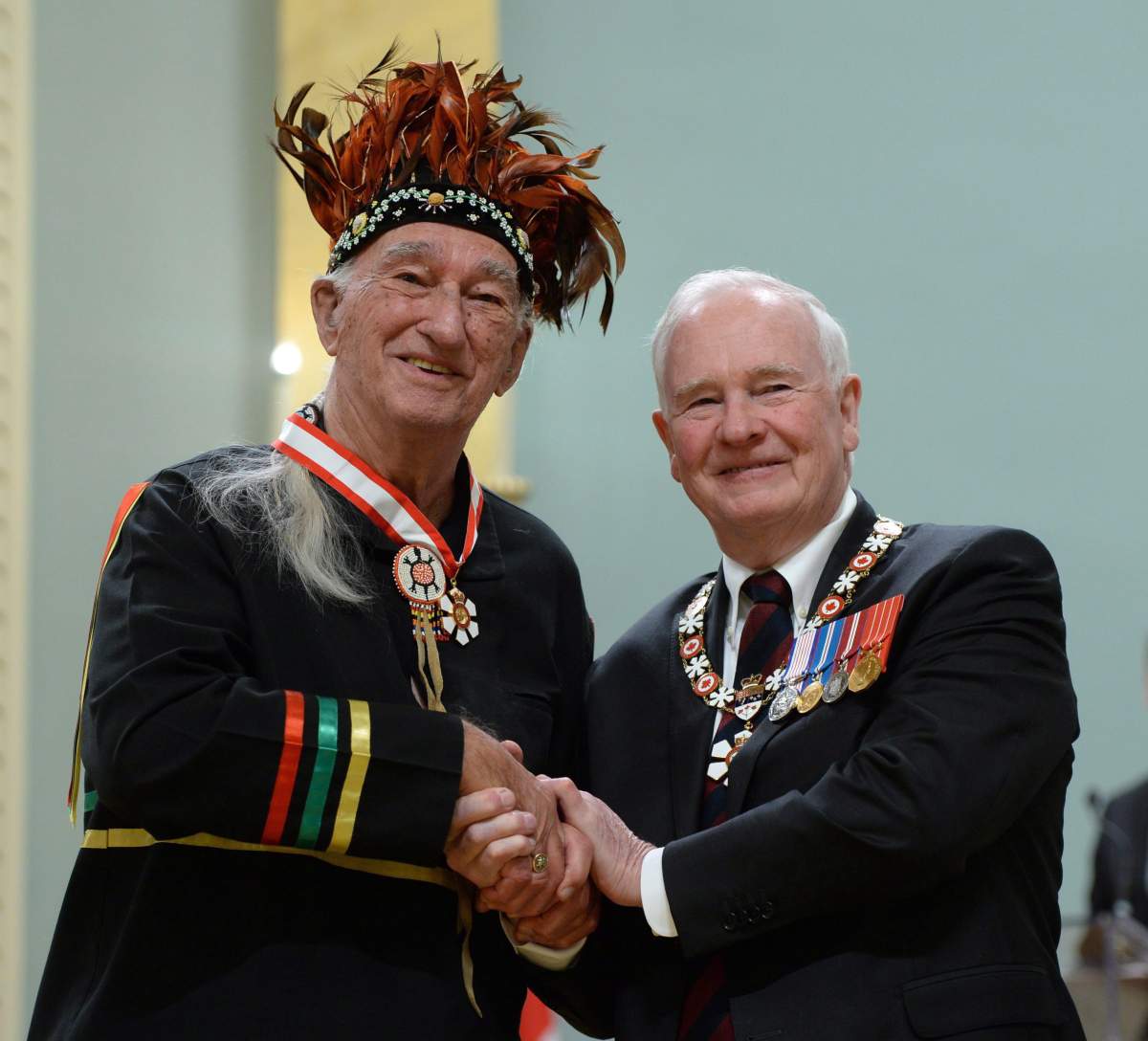 Magella (Max) Gros-Louis of Wendake, Que., gets invested as an Officer of the Order of Canada by Governor General David Johnston during a ceremony at Rideau Hall in Ottawa on Friday, Feb. 12, 2016. 
