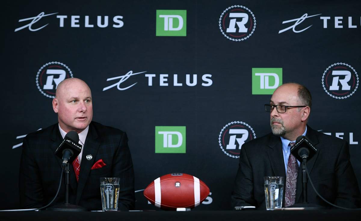 Ottawa Redblacks head coach Paul LaPolice and general manager Marcel Desjardins participate in a press conference in Ottawa, on Monday, Dec. 9, 2019. Both will be returning in 2021, the club announced Wednesday.