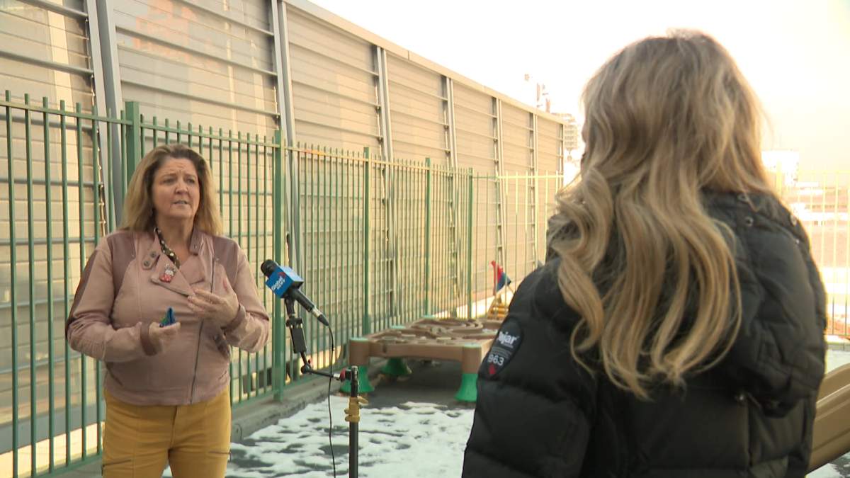 CUPS Calgary Executive Director, Carlene Donnelly, with Global Calgary reporter, Dallas Flexhaug