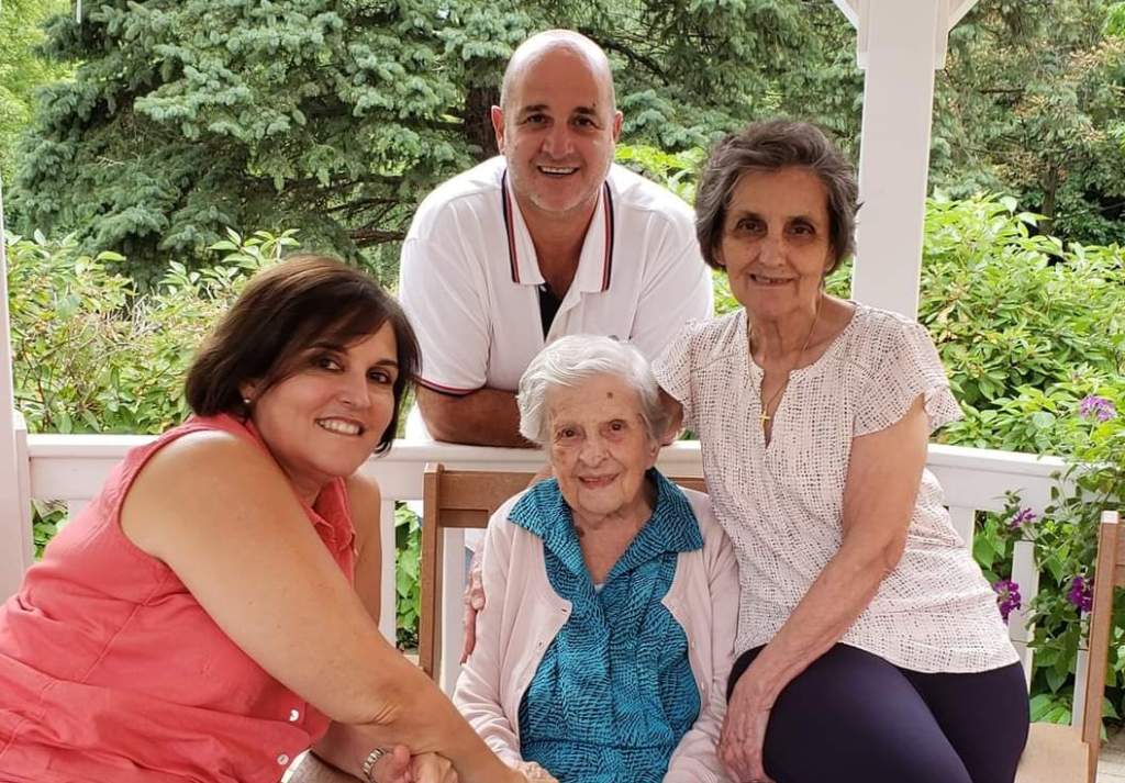Loulou Travlos (centre) with family.