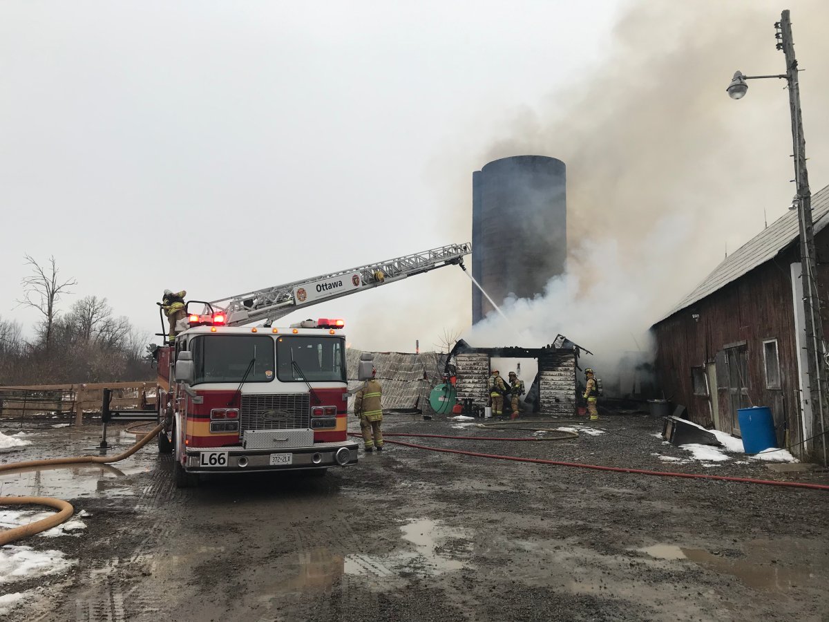 Ottawa Fire Services on-scene at a Monday morning blaze burning at a farm in the city's west end.
