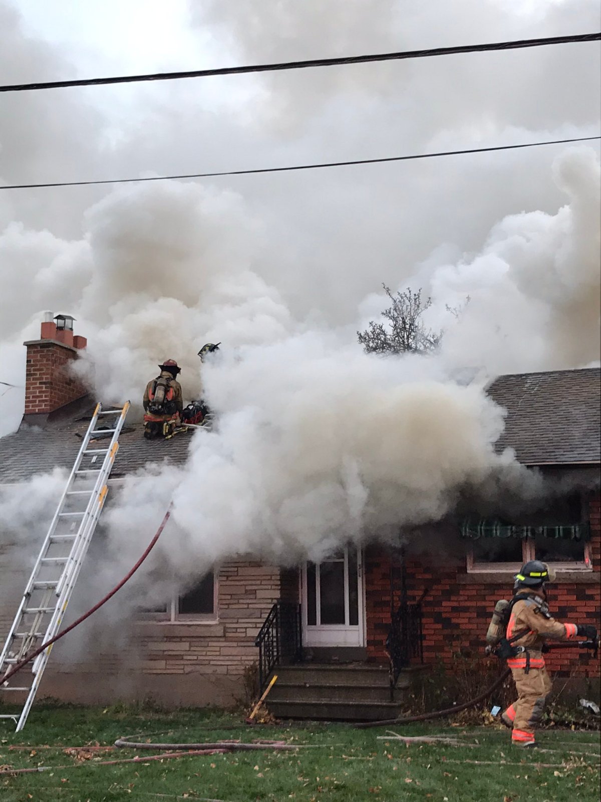 Crews battle a house fire in Stoney Creek on Tuesday morning.