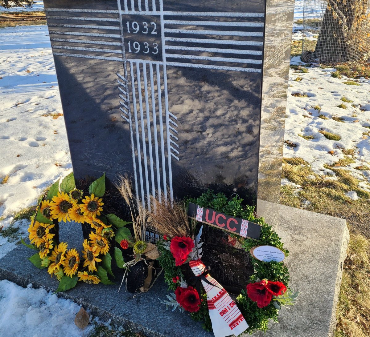 A wreath is laid at Calgary's Holodomor monument to commemorate the somber anniversary of the genocide, Saturday, Nov. 28, 2020. 