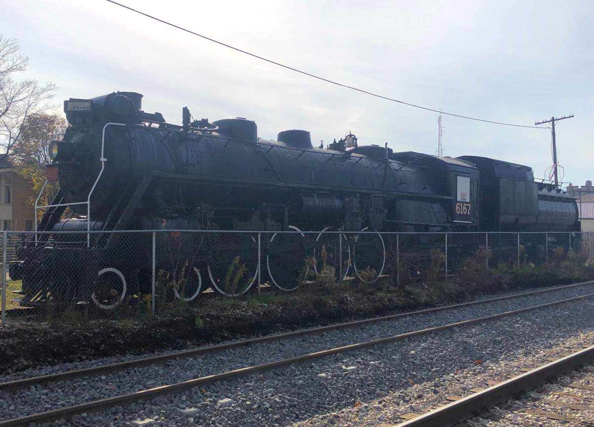 Locomotive 6167 is moving to John Galt Park. 