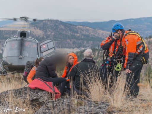 An injured hiker waits to be airlifted in Penticton.