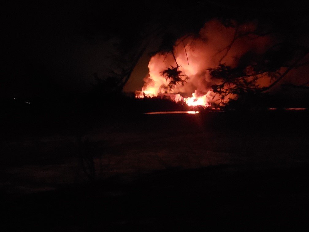 Photo of what appears to be gunman Gabriel Wortman’s cottage burning on the evening of Saturday, April 18, 2020.