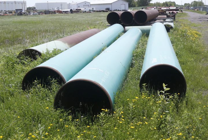 FILE - In this June 29, 2018 file photo, pipeline used to carry crude oil is shown at the Superior terminal of Enbridge Energy in Superior, Wis. 