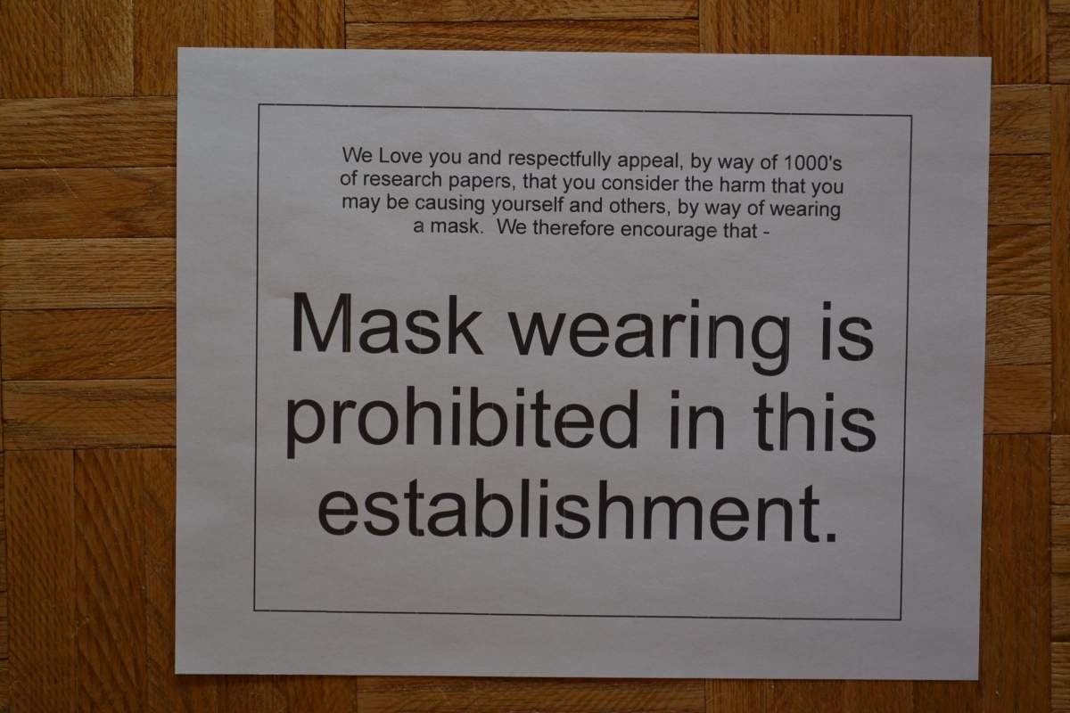 The sign at the One Eyed Budgie Gift Shop in Keremeos, B.C., says masks are prohibited inside the store. 