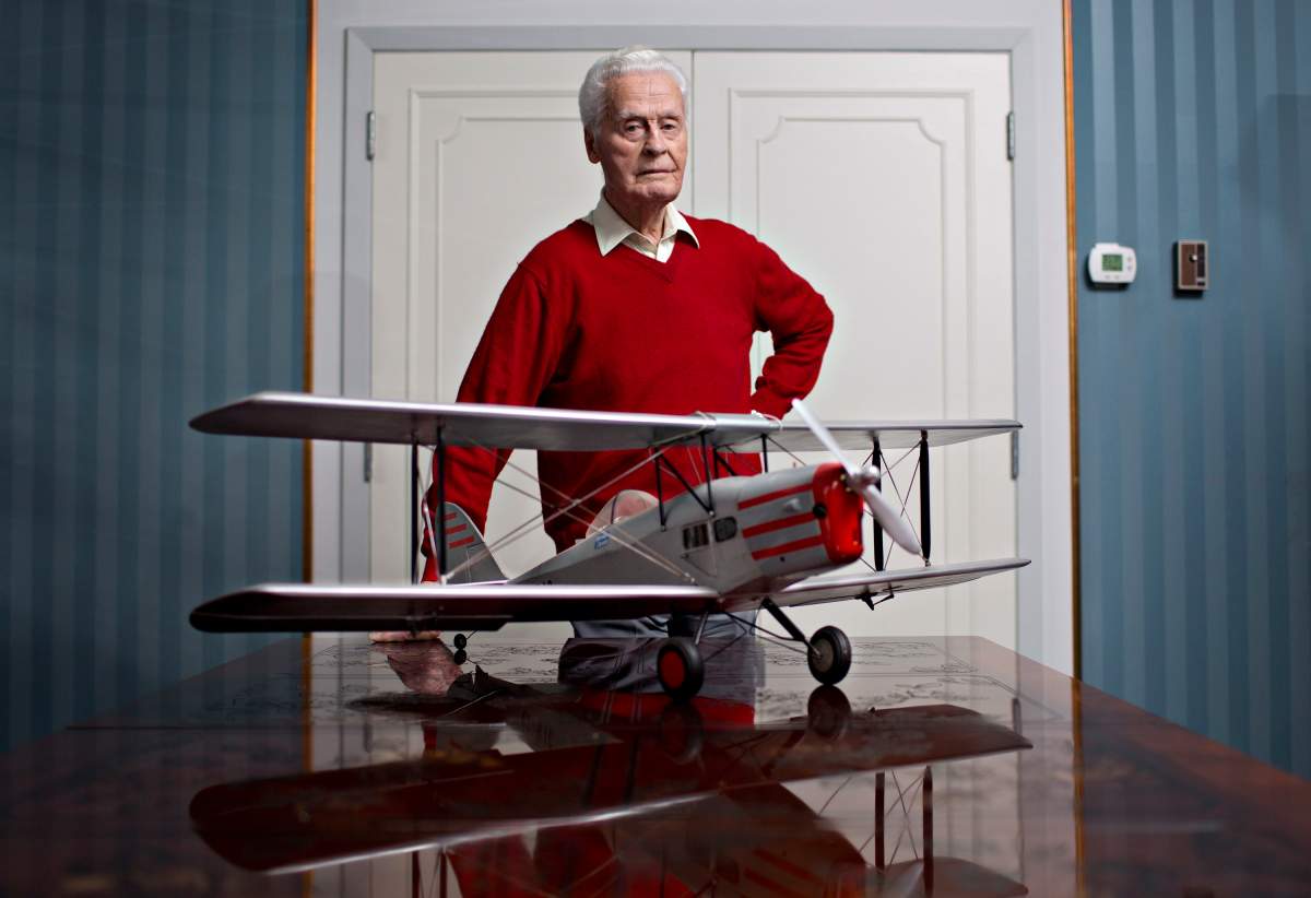 Max Ward pictured with a model of his first plane, the De Havilland Fox Moth CF-DJB, in Edmonton Alta, on Tuesday November 17, 2015.