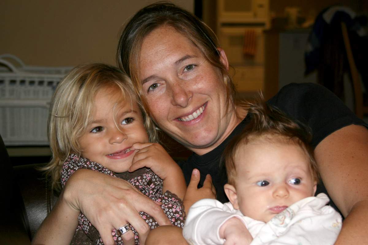 Nancy Cooper poses with her daughters, Bella and Katie.