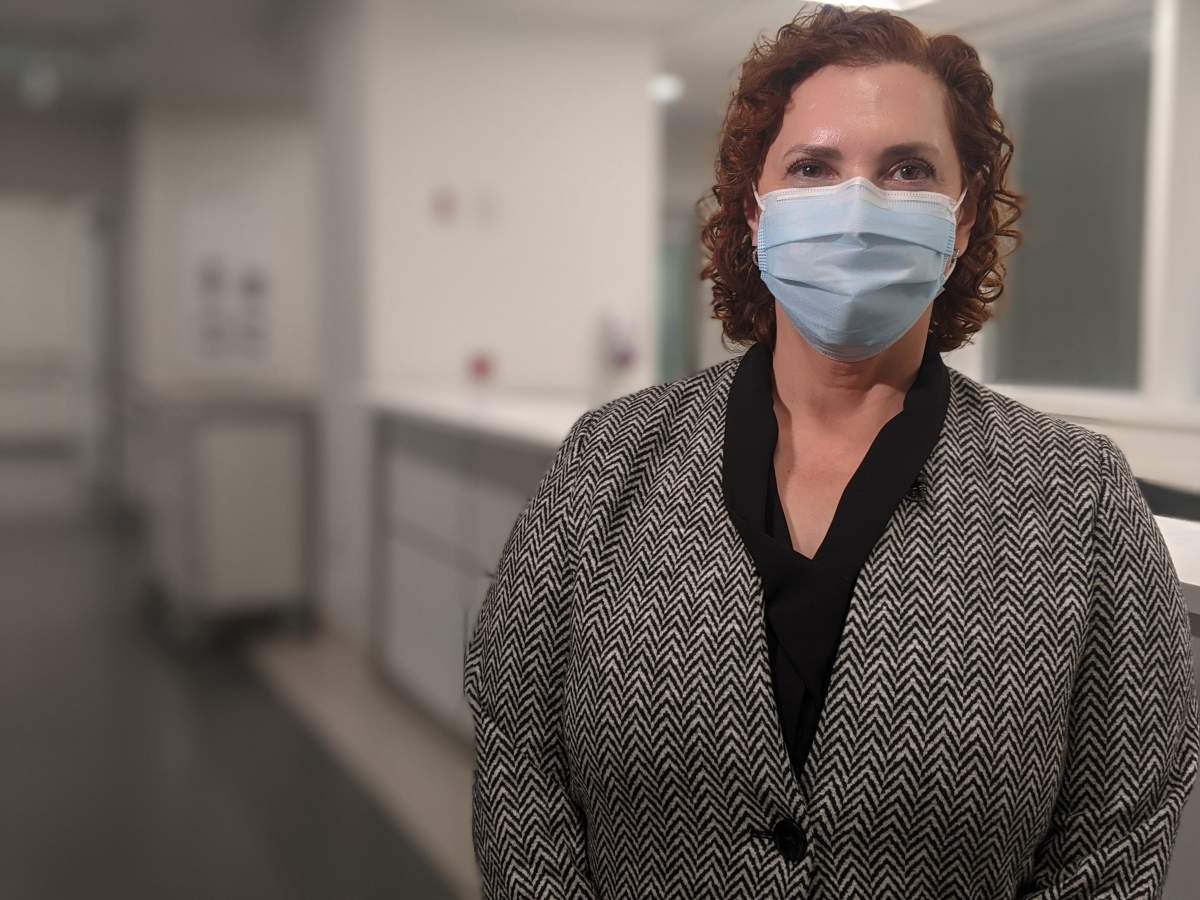 Mary-Agnes Wilson, chief operating officer and chief nursing executive with Mackenzie Health stands in the hallway of the critical care unit.