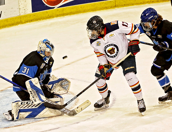 Penticton Vees goaltender Kaeden Lane stops a shot during BCHL action against the Vernon Vipers on Friday night.