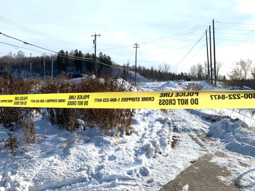 Edmonton police tape blocking off access to the North Saskatchewan River after a body was found on an ice flow near the Dawson Bridge on Thursday, Nov. 12, 2020.