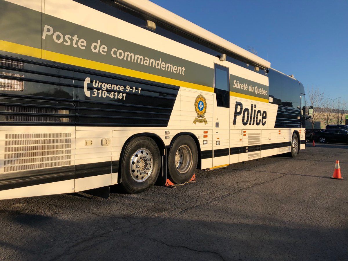 This November 2020 file photo shows an SQ command post at Quartier Dix30, a busy shopping district where a man was fatally shot in 2019.