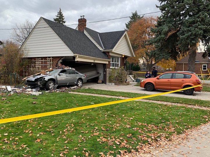 A photo of a car that crashed into a house on Parkview Hill Crescent in Toronto.