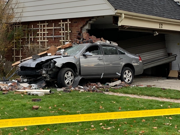 A photo of a car that crashed into a house on Parkview Hill Crescent in Toronto.