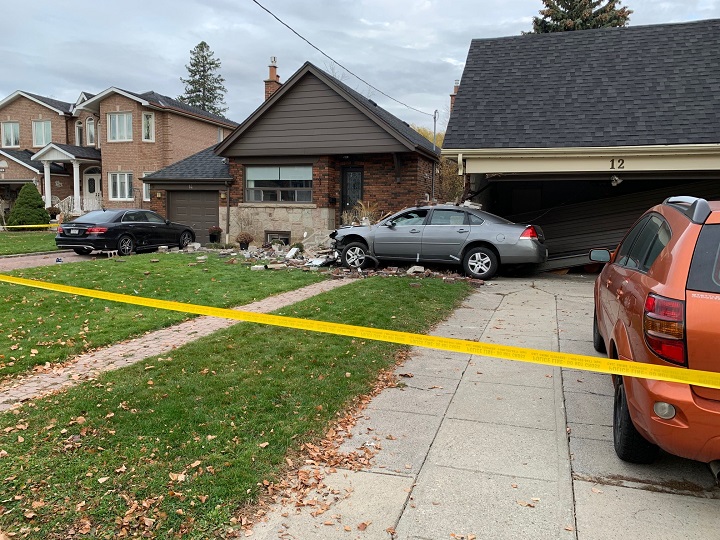 A photo of a car that crashed into a house on Parkview Hill Crescent in Toronto.