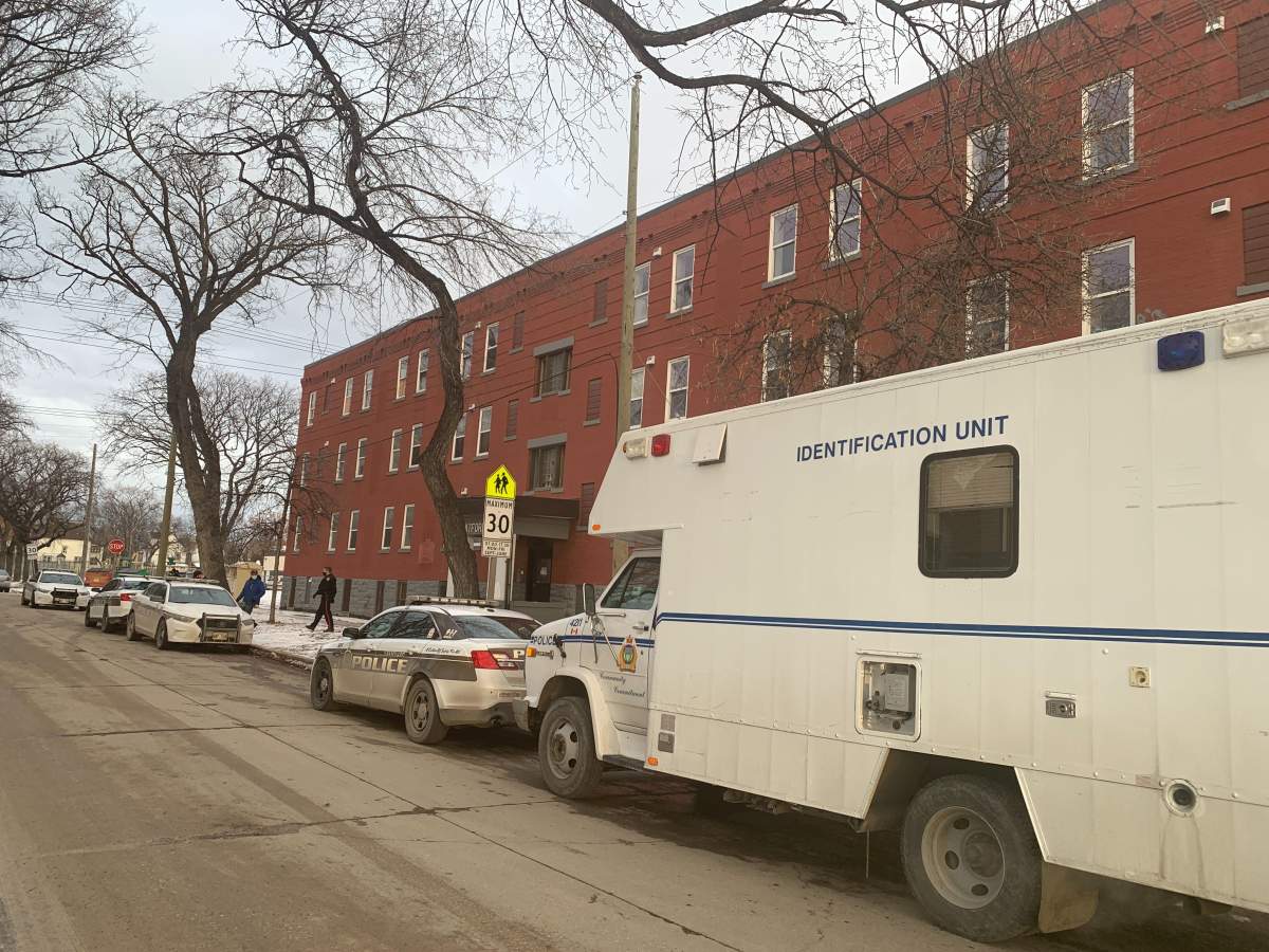 A Winnipeg police identification unit at a College Avenue apartment block Nov. 27.