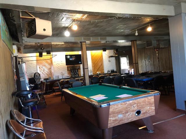 The bar at the Corona Hotel, as seen in a real estate listing.