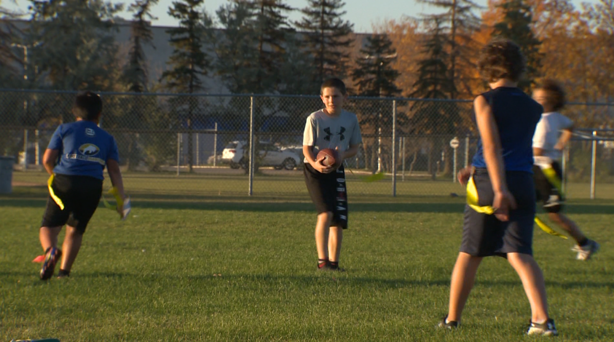 Gus Raetson, of the Thundercats flag football team, scoring a touchdown.