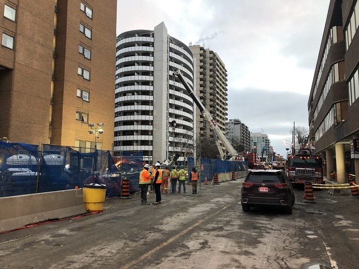 A crane tipped over near the future Mount Pleasant Eglinton-Crosstown station.