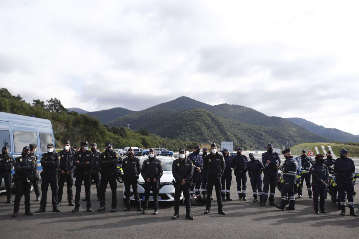 Police officers attend the French President’s visit to the border between France and Spain, during which he announced that the number of border guards would be doubled to 4,800 from 2,400 “because of the worsening of the threat” from terrorism.