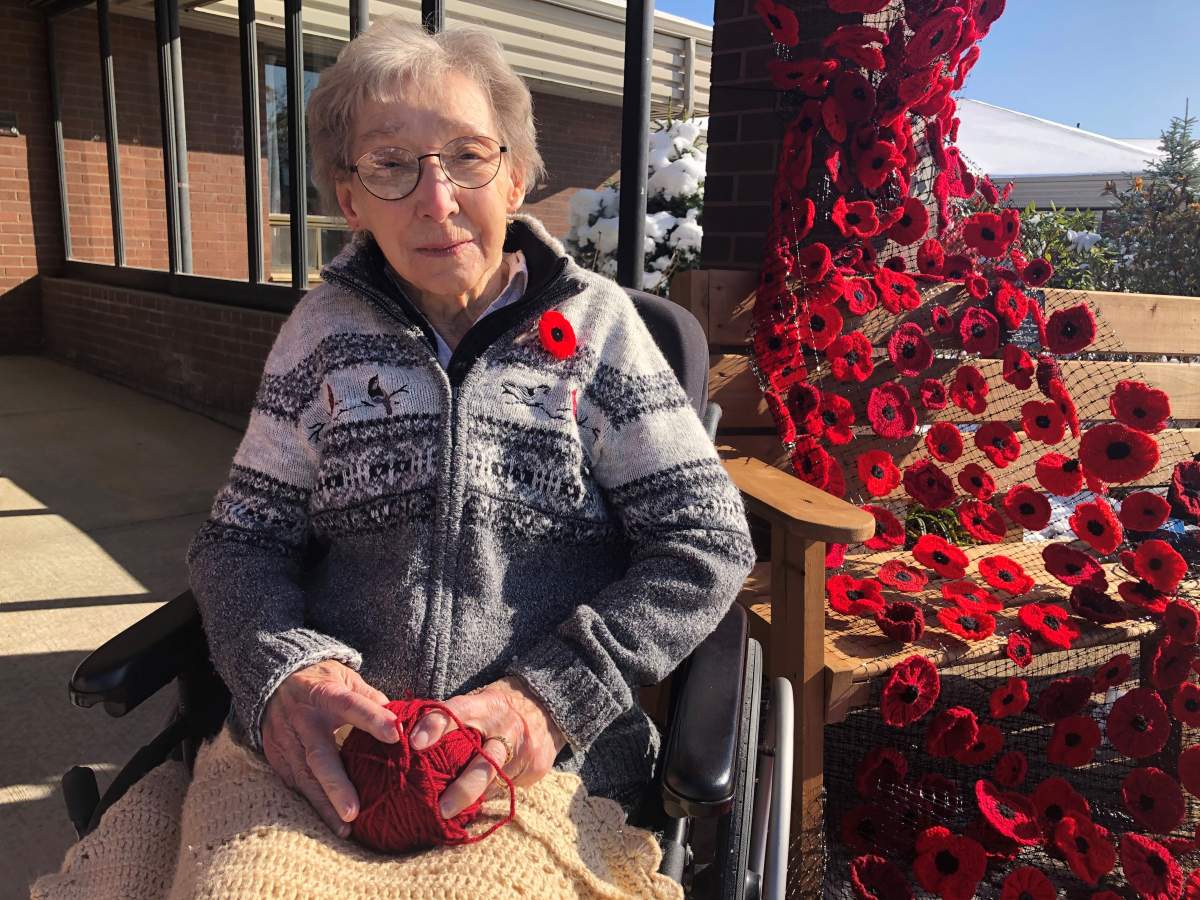 Nursing home resident, Evelyn Graves, 89, helped work on the Remembrance Day poppy display