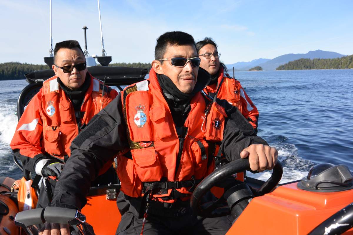 Numuch Keitlah, left, and Jake Thomas, centre, participate in a Coastal Nations search and rescue exercise off the coast of Vancouver Island in this undated handout photo. The recently operational Coastal Nations Coast Guard Auxiliary has more than 50 members from five Indigenous territories who are trained in marine search and rescue. They are on call day and night to respond to emergencies along some of B.C.'s most rugged and remote coastal areas. 