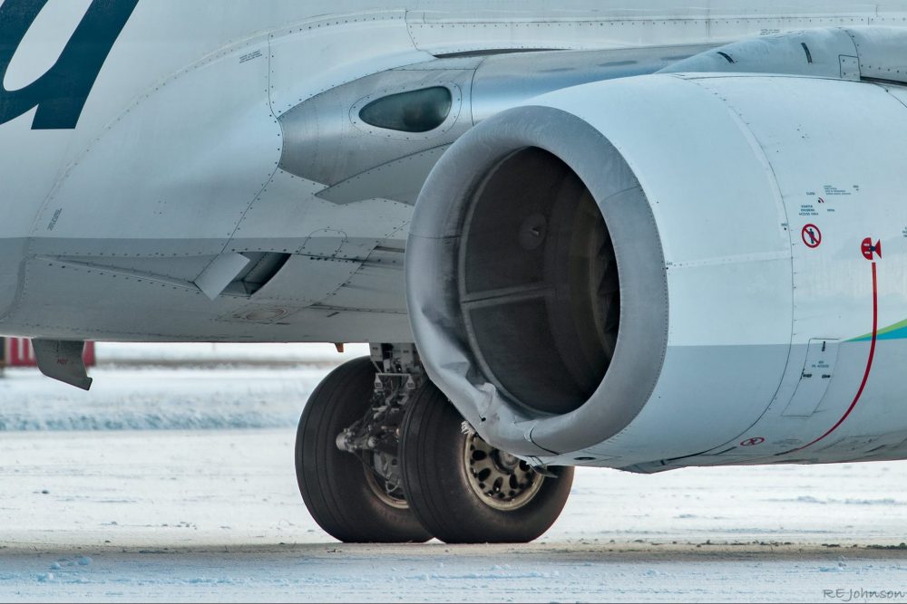 The dented left engine of Alaska Airlines flight 66 is shown on the runway at Yakutat Airport in Alaska on Nov. 15, 2020.