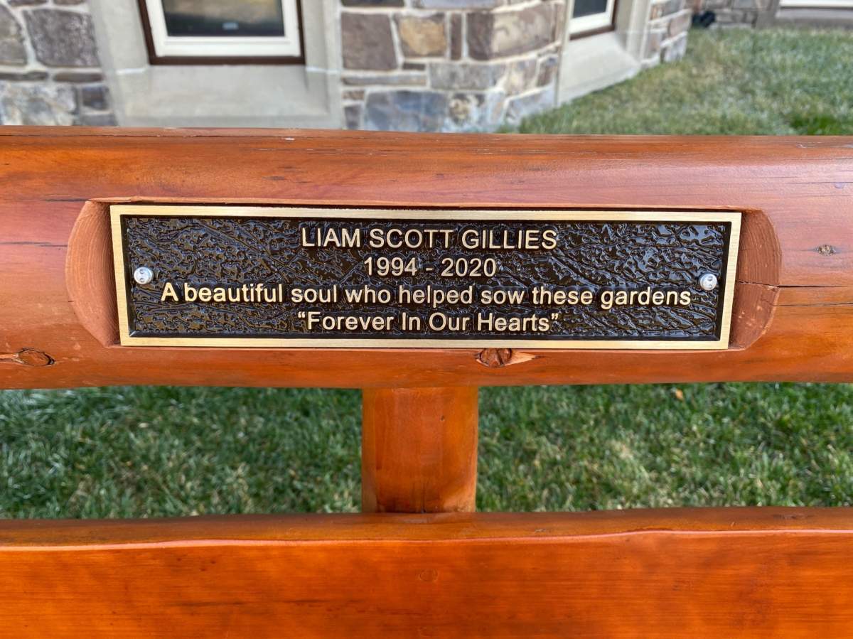 A bench commemmorating Liam Gillies sits in the Cascades Of Time Gardens in Banff.