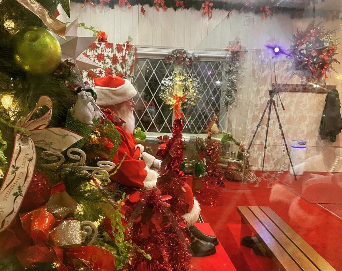 The charming red house is located in Victoria Park, just east of the band shell.