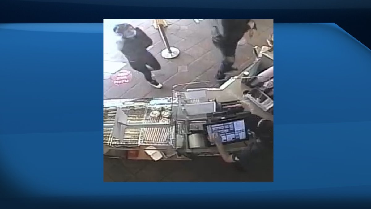 Kingston police are looking for a woman who stole a poppy donation box at a downtown Tim Hortons. 