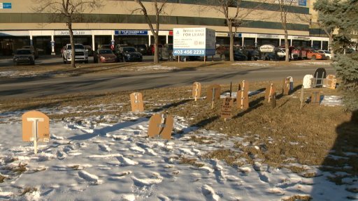 Cardboard tombstones were seen outside Alberta Health Minister Tyler Shandro’s constituency office in Calgary, Alta., Monday, Nov. 23, 2020.