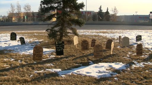 Cardboard tombstones were seen outside Alberta Health Minister Tyler Shandro’s constituency office in Calgary, Alta., Monday, Nov. 23, 2020.